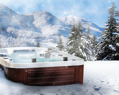 Coast Spas Curve Spa Series design hot tub in mountain with snow