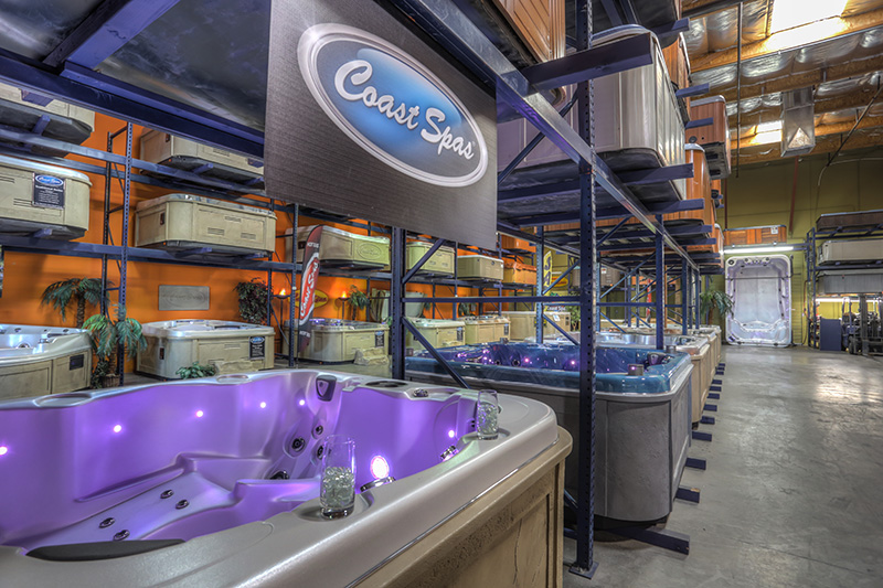 Coast Spas in Hot Tub Liquidators warehouse. No cost spa evaluations. Consignment hot tub and swim spa sales.